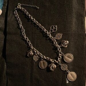 Vintage-Inspired Silver Charm Necklace - Floral Medallion Design